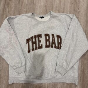 The Bar Gray Crewneck Sweater with Brown Lettering